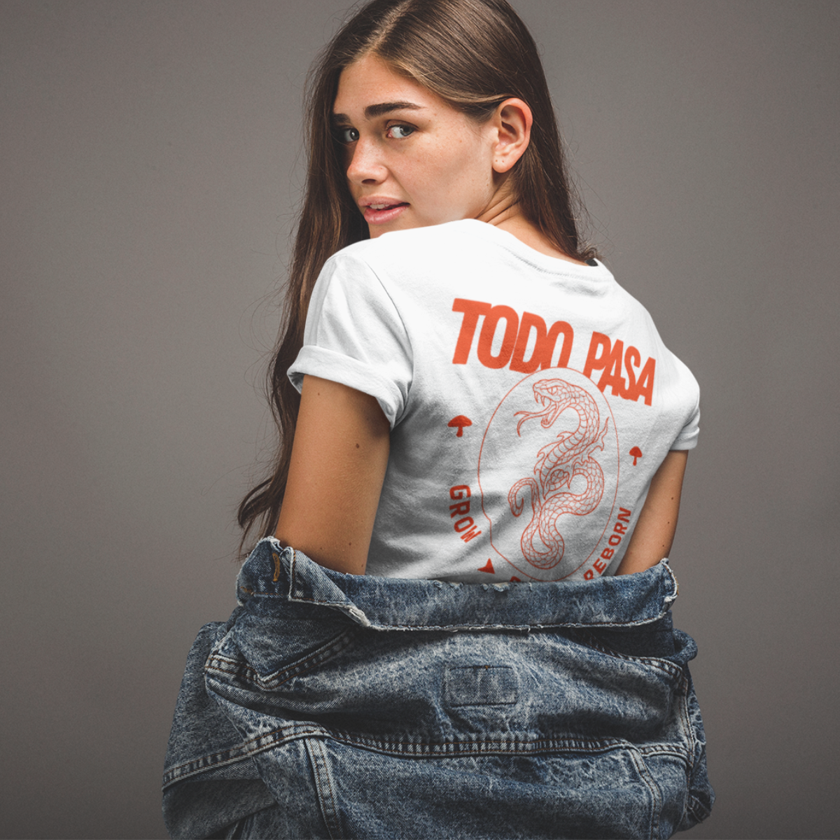 woman wearing a white t-shirt with red text and graphics on a gray background