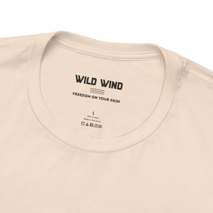 Beige t-shirt with 'Wild Wind' text and branding details on a white background