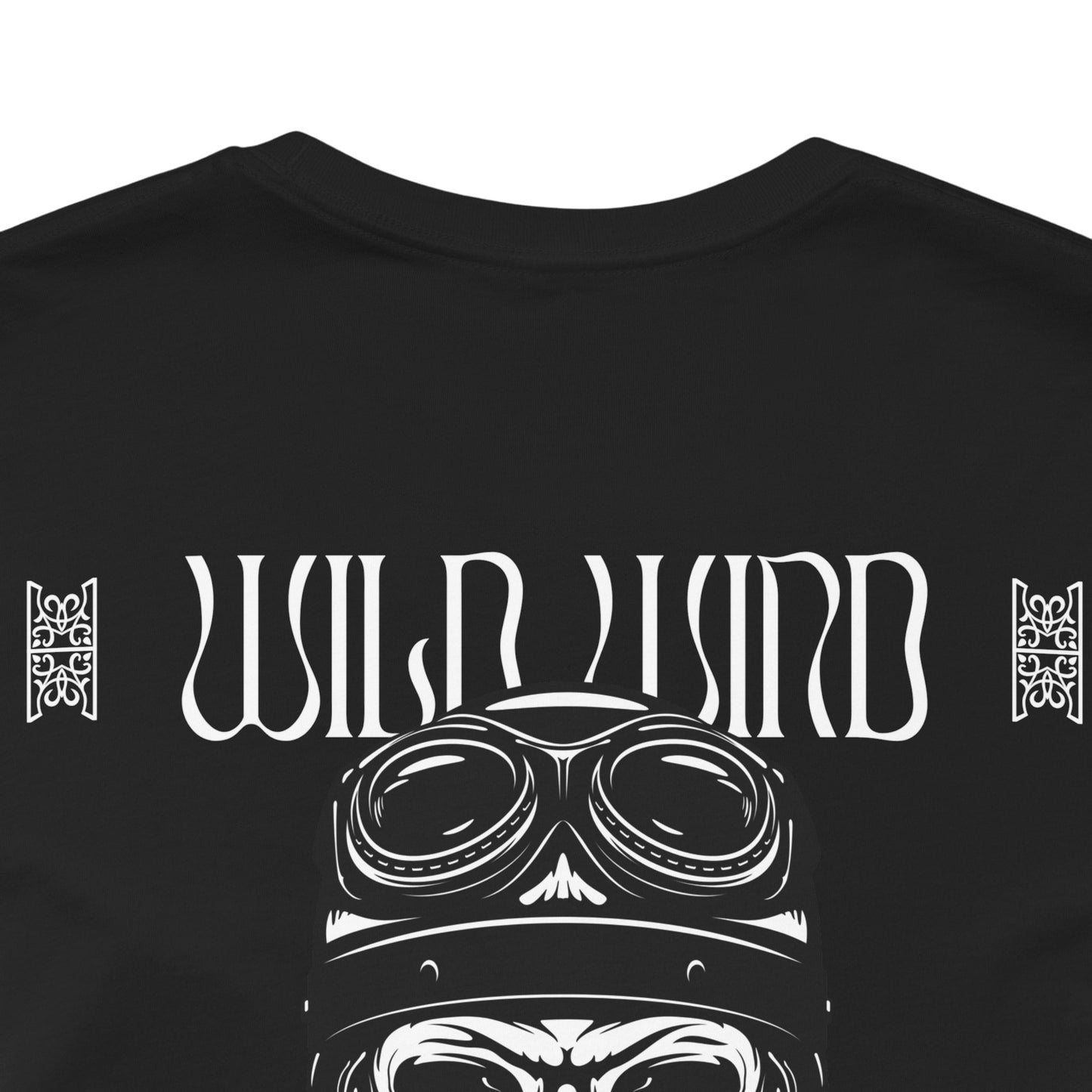 dark grey t-shirt with 'Wild Wind' design featuring goggles and tribal elements on a white background